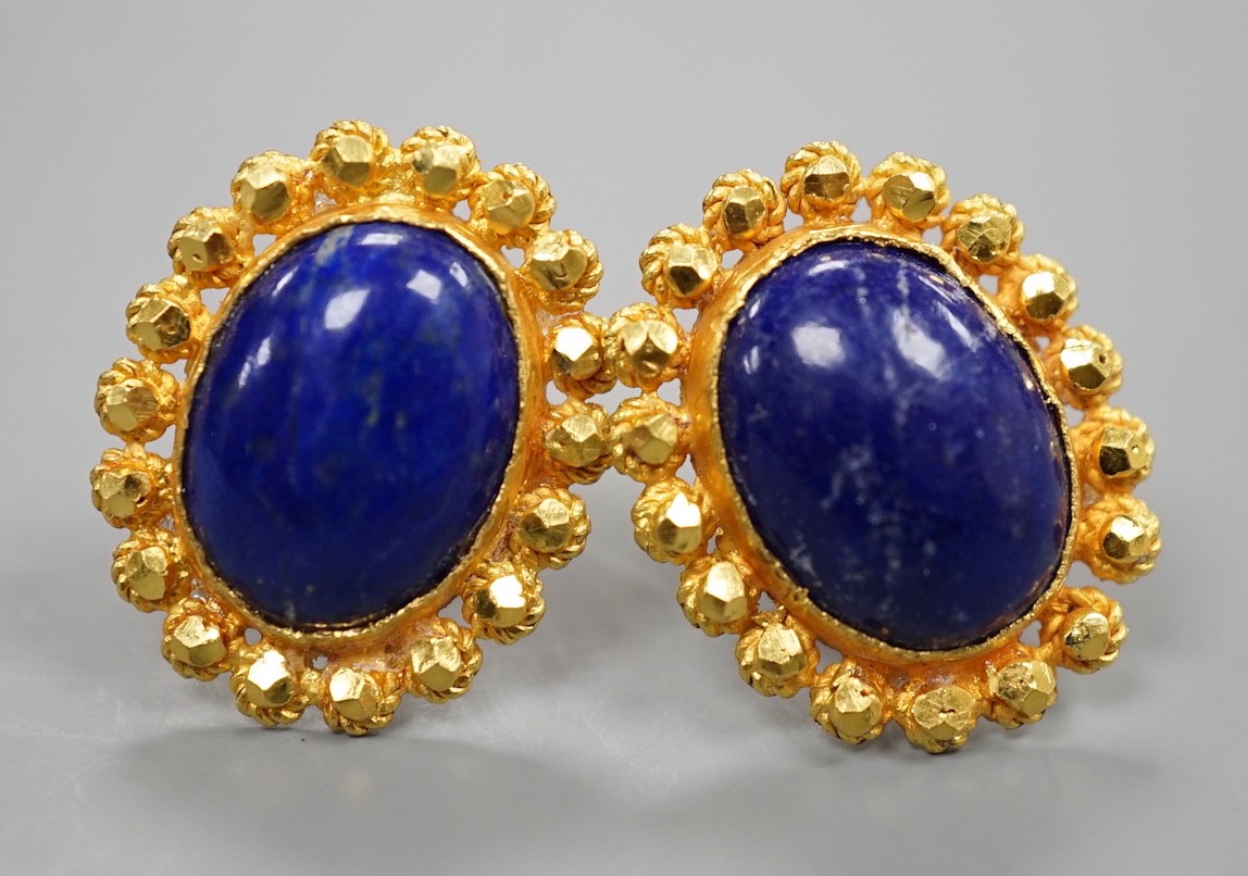 A pair of bright cut yellow metal and lapis lazuli set oval earrings, 20mm, gross weight 9.5 grams.